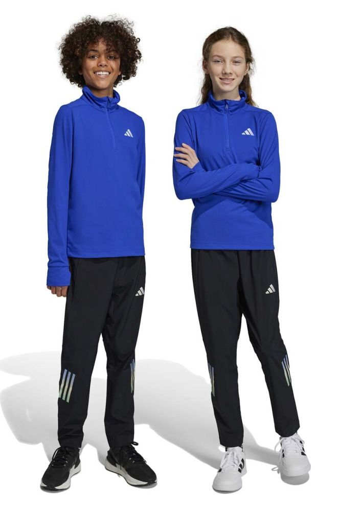 Дитячі спортивні штани adidas U RUN WV колір чорний з принтом